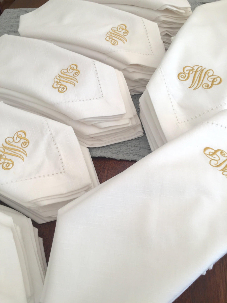 http://whitetulipembroidery.com/cdn/shop/collections/three-initial-monogrammed-napkins-white-tulip-embroidery_1200x1200.jpg?v=1676213171