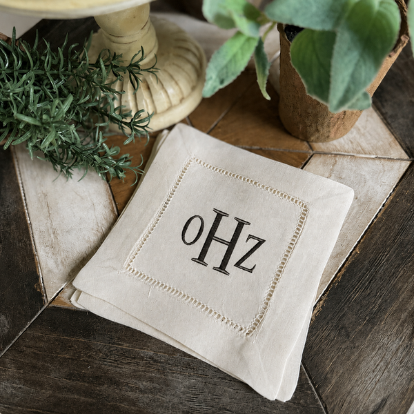 Set of 32 OHZ Ivory Cocktail Napkins, Black Thread, Event Date July 24,2026 - White Tulip Embroidery