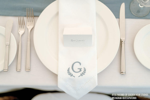 https://whitetulipembroidery.com/cdn/shop/products/laurel-leaf-monogrammed-embroidered-cloth-dinner-napkins-white-tulip-embroidery-2_grande.jpg?v=1699449964