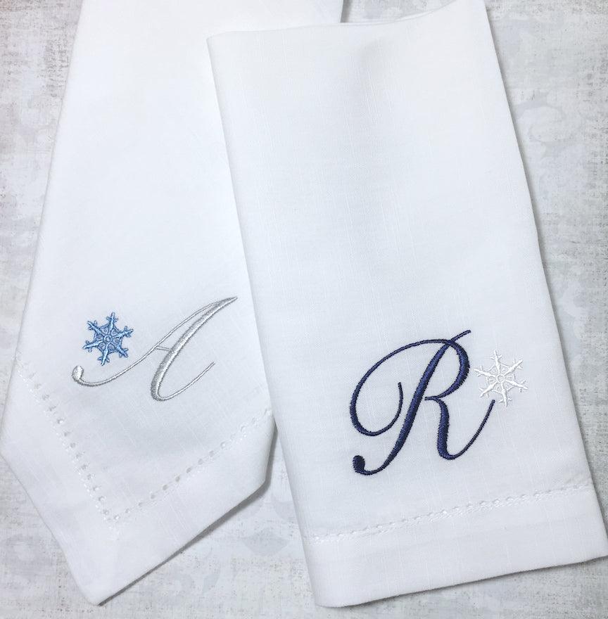 https://whitetulipembroidery.com/cdn/shop/products/monogrammed-christmas-snowflake-embroidered-cloth-napkins-set-of-4-napkins-white-tulip-embroidery-2.jpg?v=1676306368
