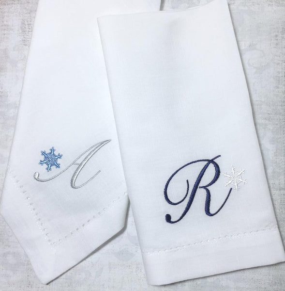 https://whitetulipembroidery.com/cdn/shop/products/monogrammed-christmas-snowflake-embroidered-cloth-napkins-set-of-4-napkins-white-tulip-embroidery-2_grande.jpg?v=1676306368