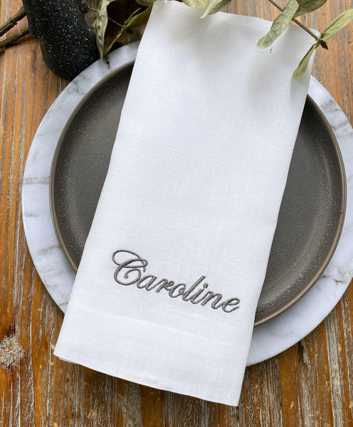 https://whitetulipembroidery.com/cdn/shop/products/set-of-100-personalized-wedding-party-monogrammed-name-napkins-bulk-names-napkins-white-tulip-embroidery-5_grande.jpg?v=1688732274